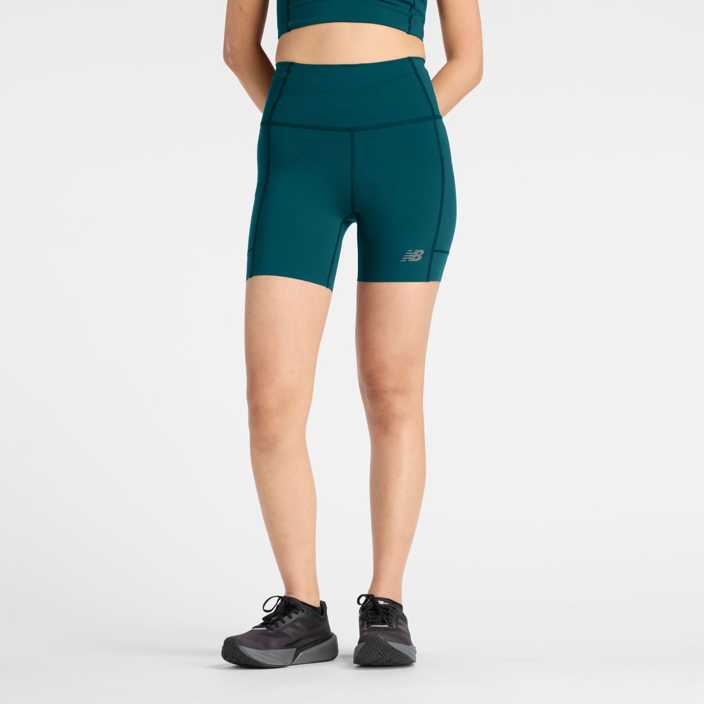 Женские шорты New Balance RC Elite Storage Short 6", цвет: Зелёный — фото 1