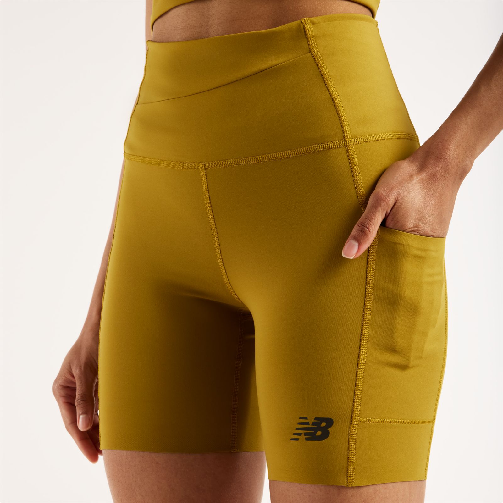 Женские брюки New Balance RC Elite Storage Short 6" — фото 2