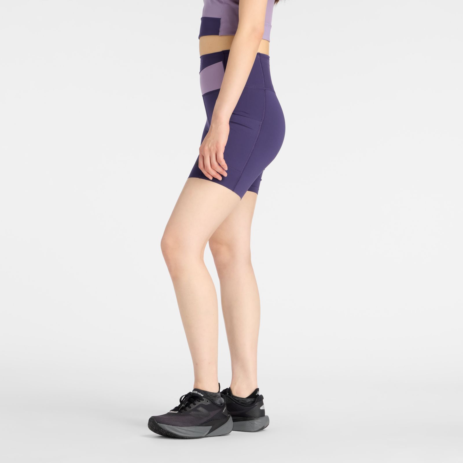 Женские брюки New Balance RC Elite Storage Short 6" — фото 5
