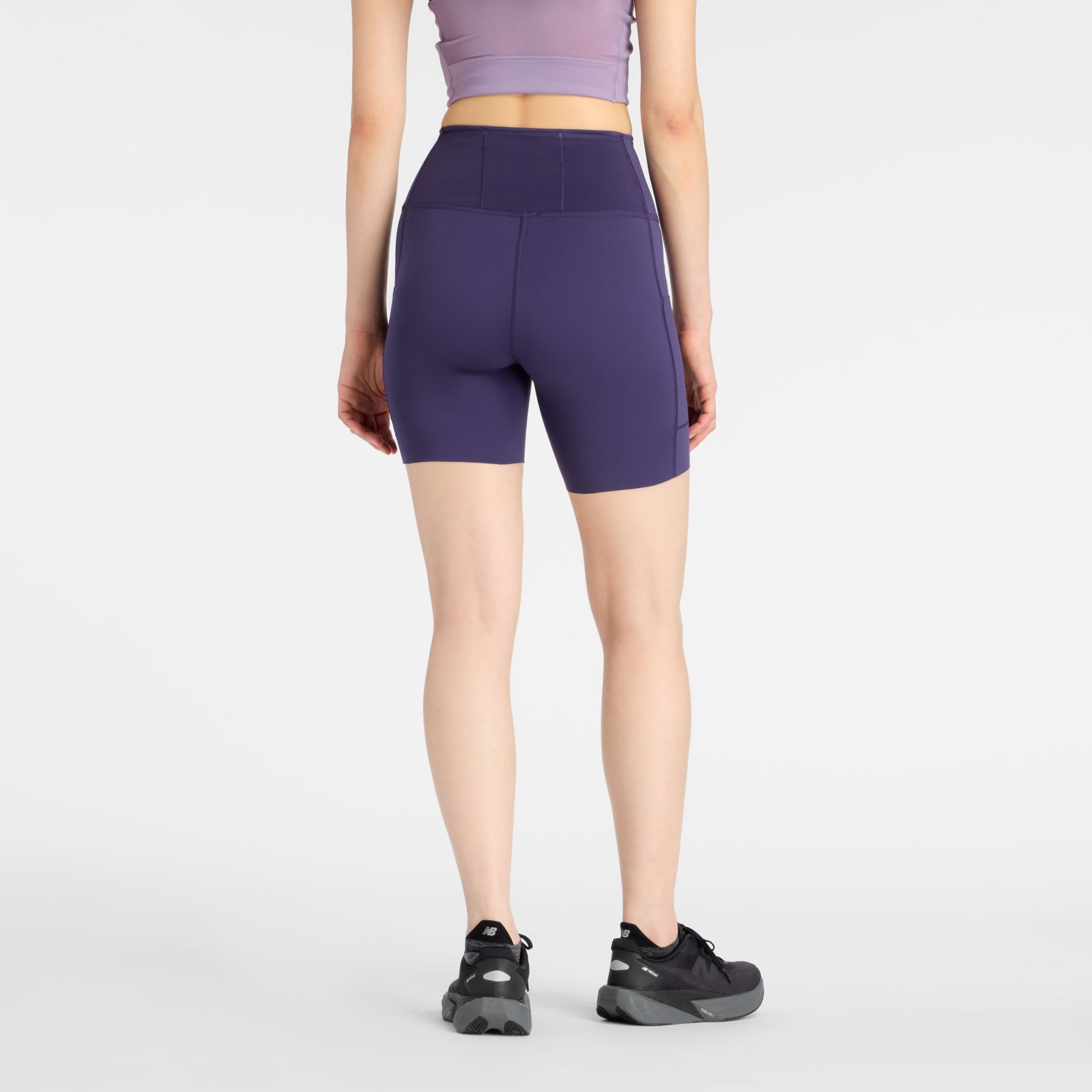 Женские брюки New Balance RC Elite Storage Short 6" — фото 4