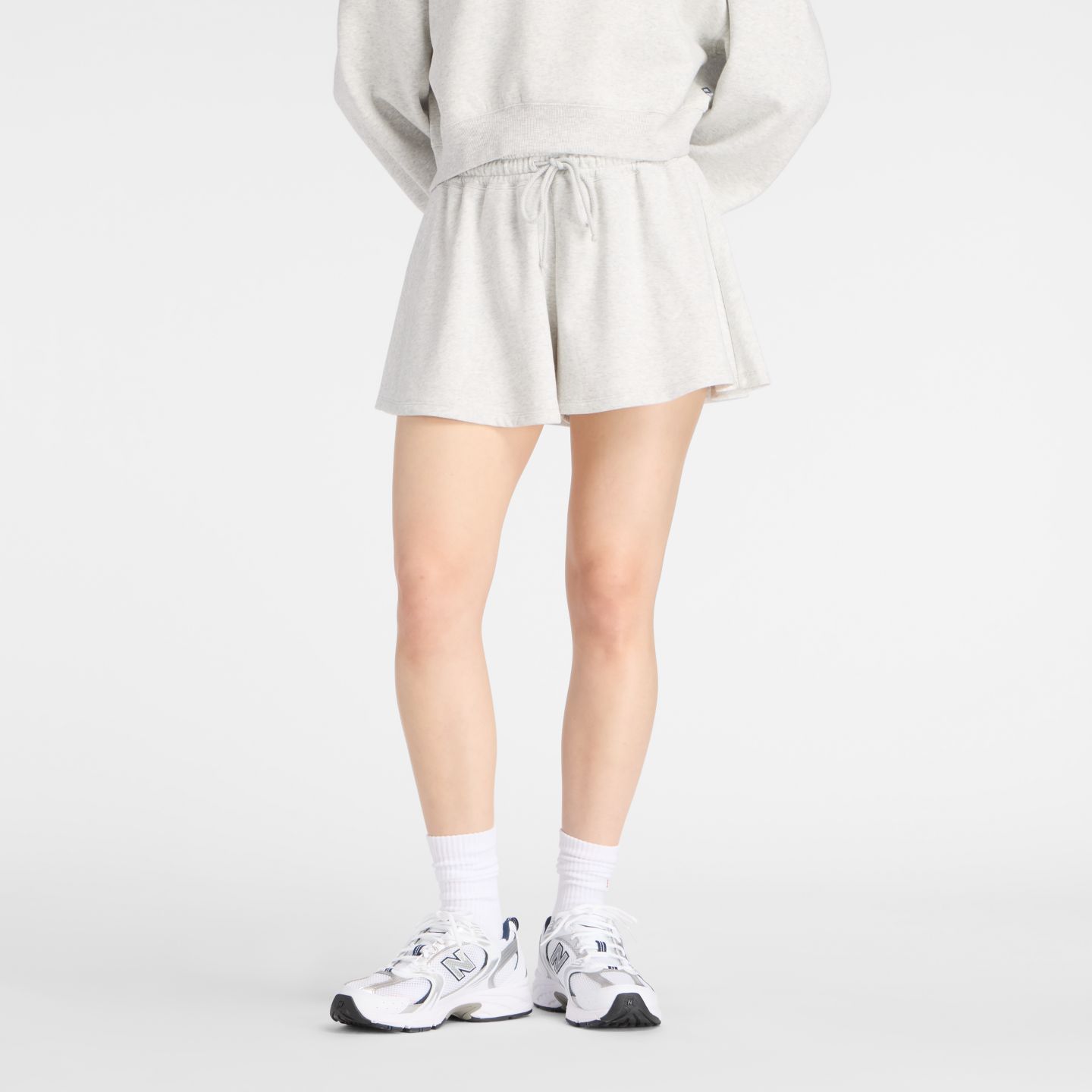 Женские шорты New Balance French Terry Circle Short, цвет: Пепельный меланжевый — фото 1