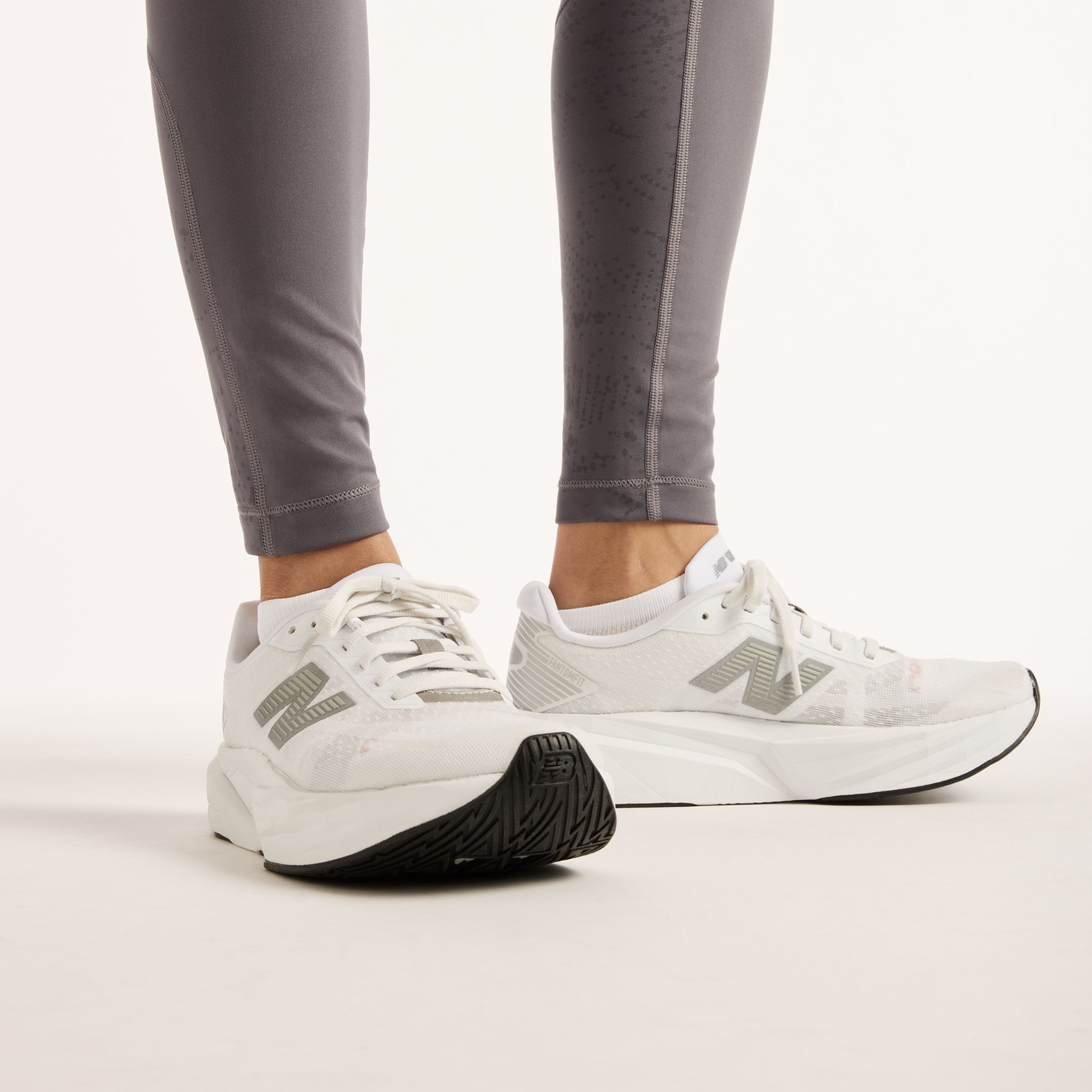 New Balance Reflective RC Heat Legging 27", WB6239K1AA9