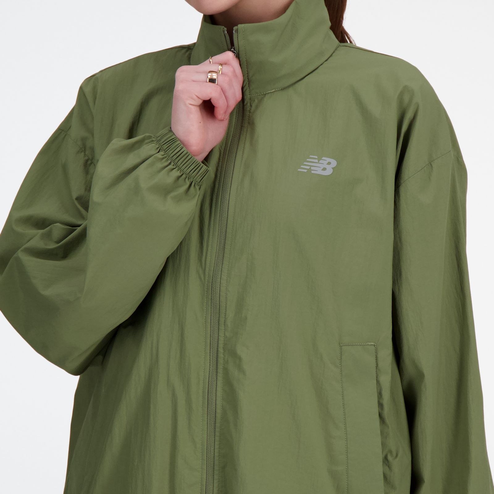 Женские куртки New Balance RC Essential Packable Jacket — фото 6
