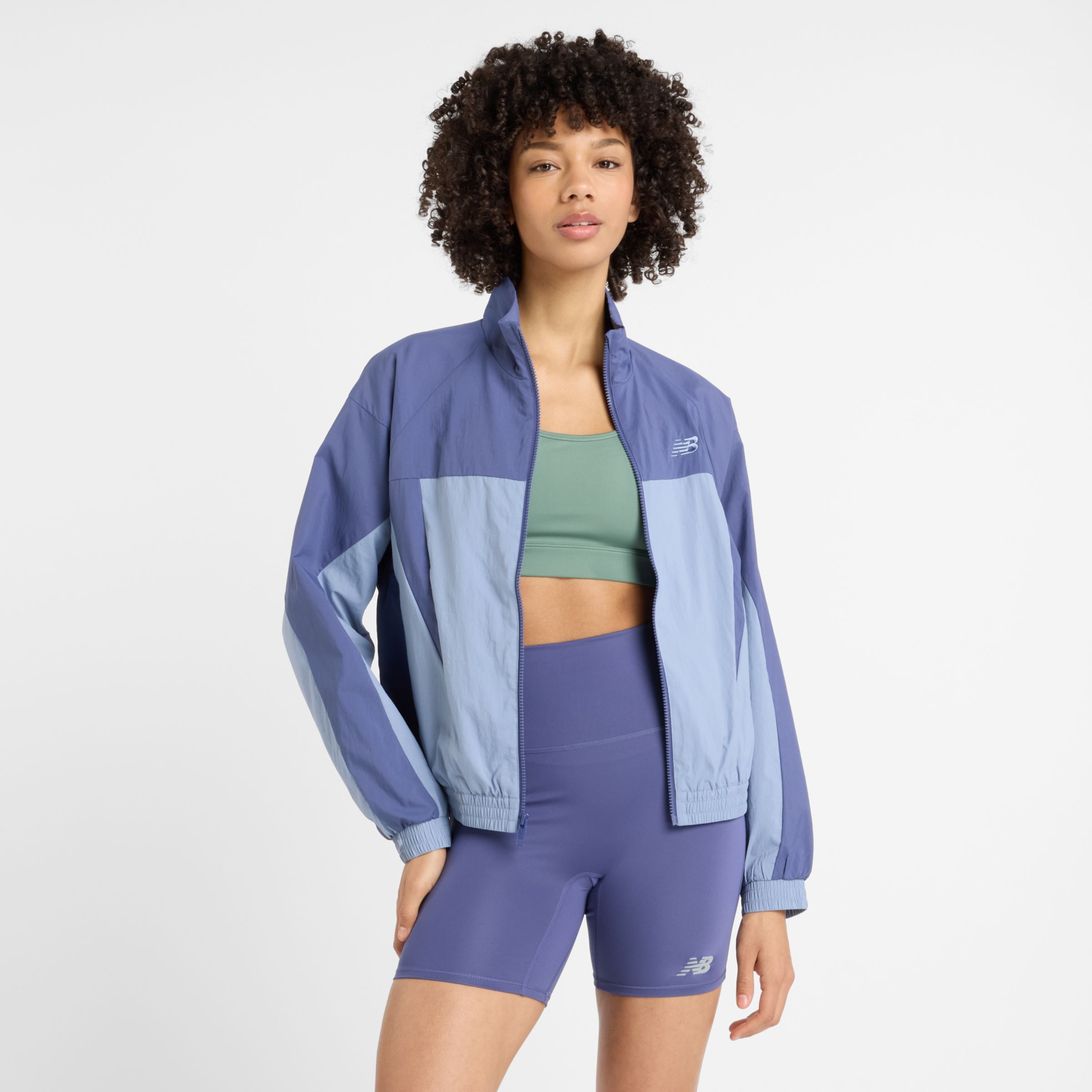 New Balance Women's Color Blocked Woven Jacket in Blue Polywoven, size Small
