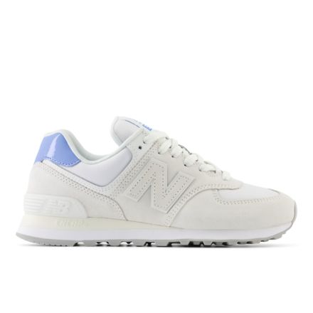New Balance 574 trainers in metallic white and silver