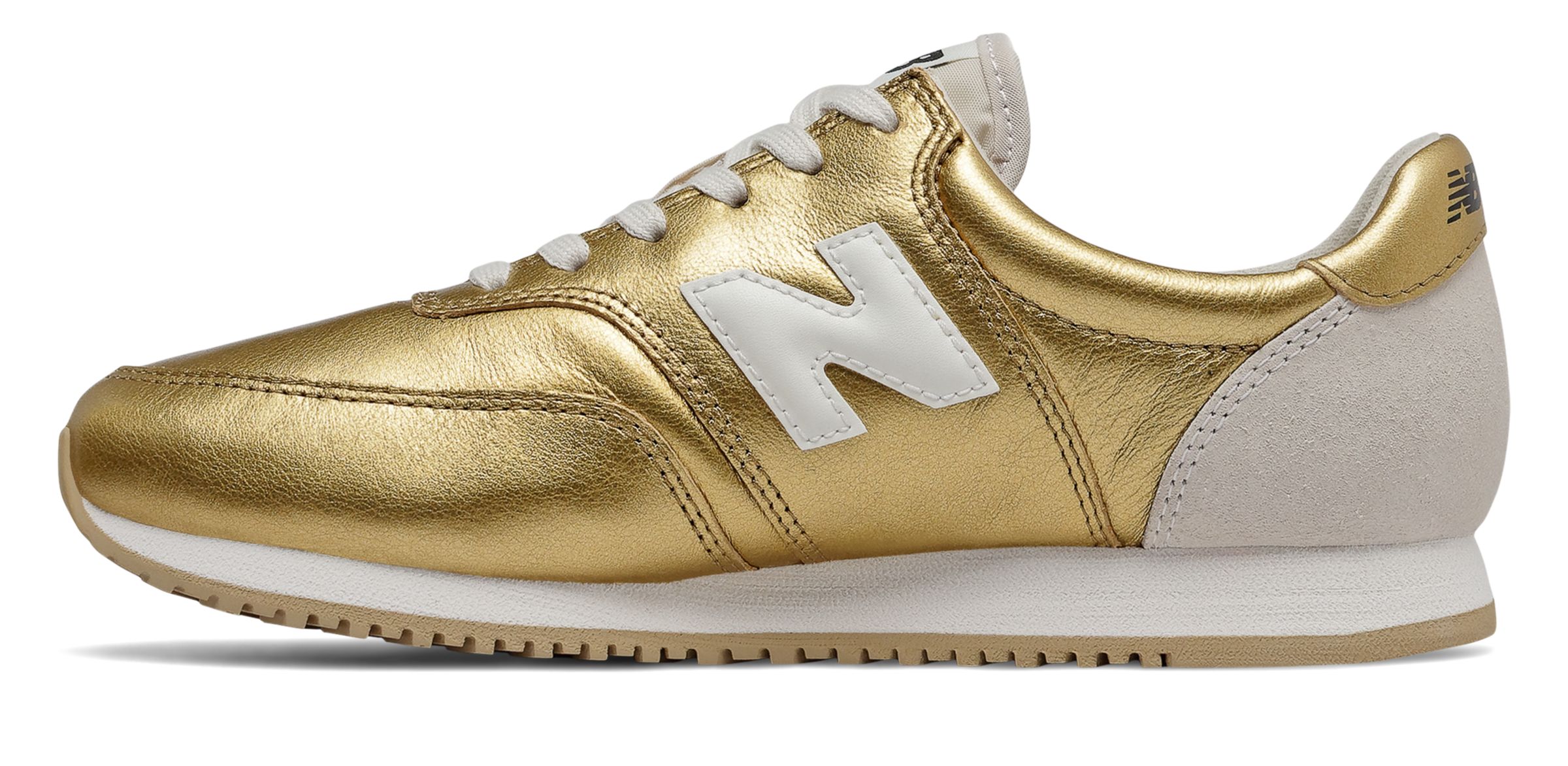 new balance womens comp 100