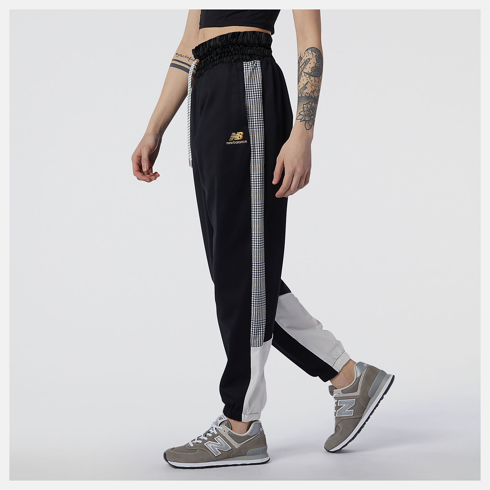 New Balance Nb Athletics Higher Learning Stripe Track Pant in Black Slacks and Chinos Straight-leg trousers Save 33% Womens Clothing Trousers 
