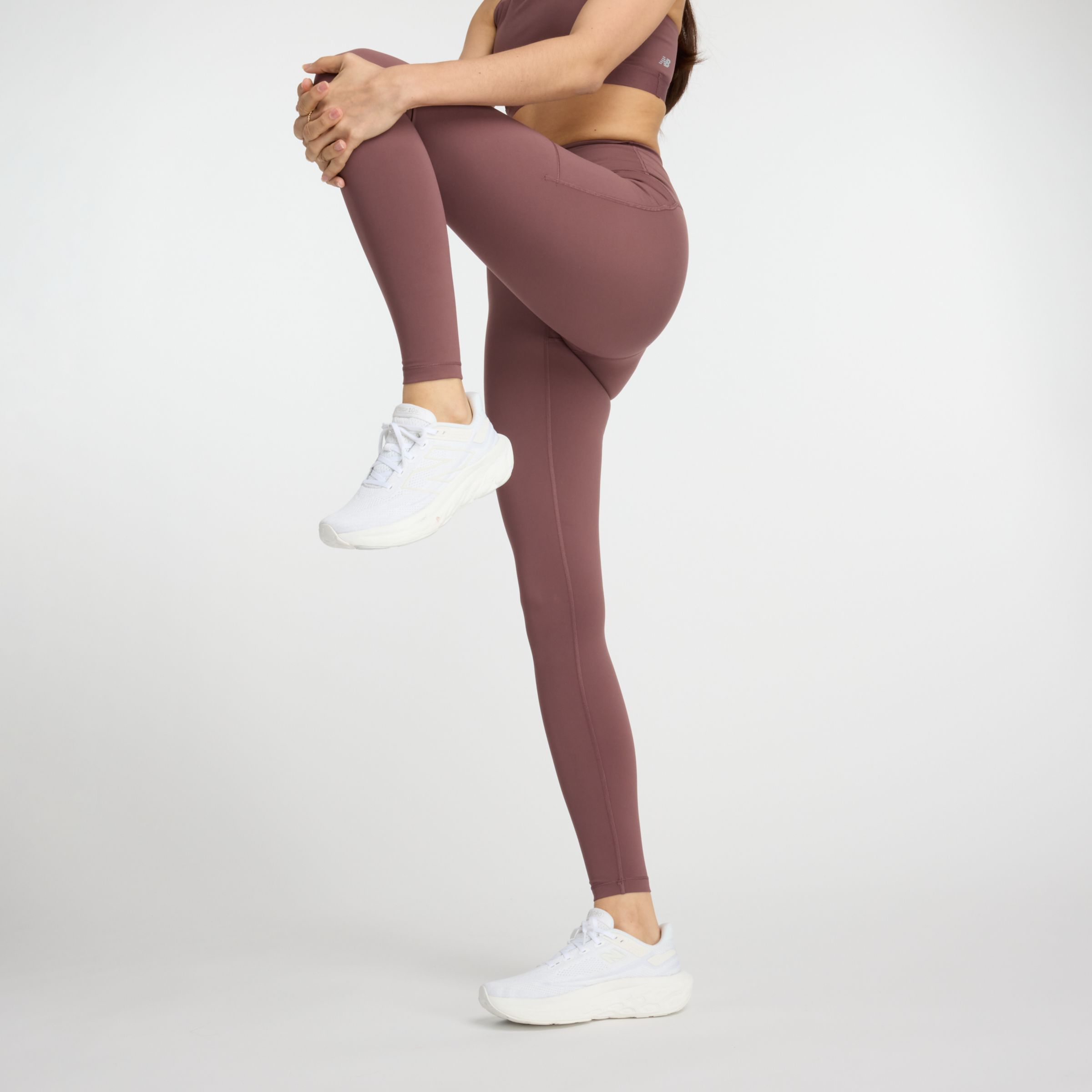 Shop New Balance Women's Nb Sleek Pocket High Rise Legging 27" In Brown