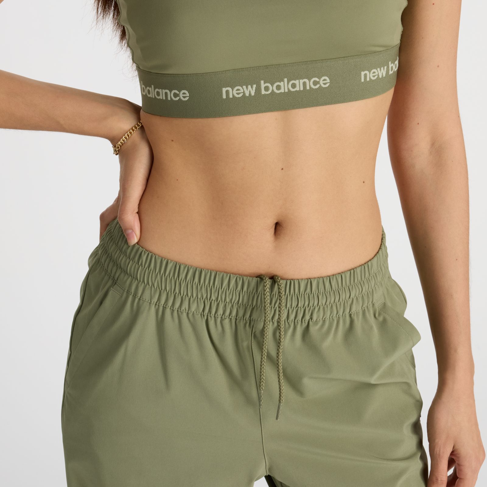 Женские брюки New Balance Athletics Stretch Woven Jogger — фото 6