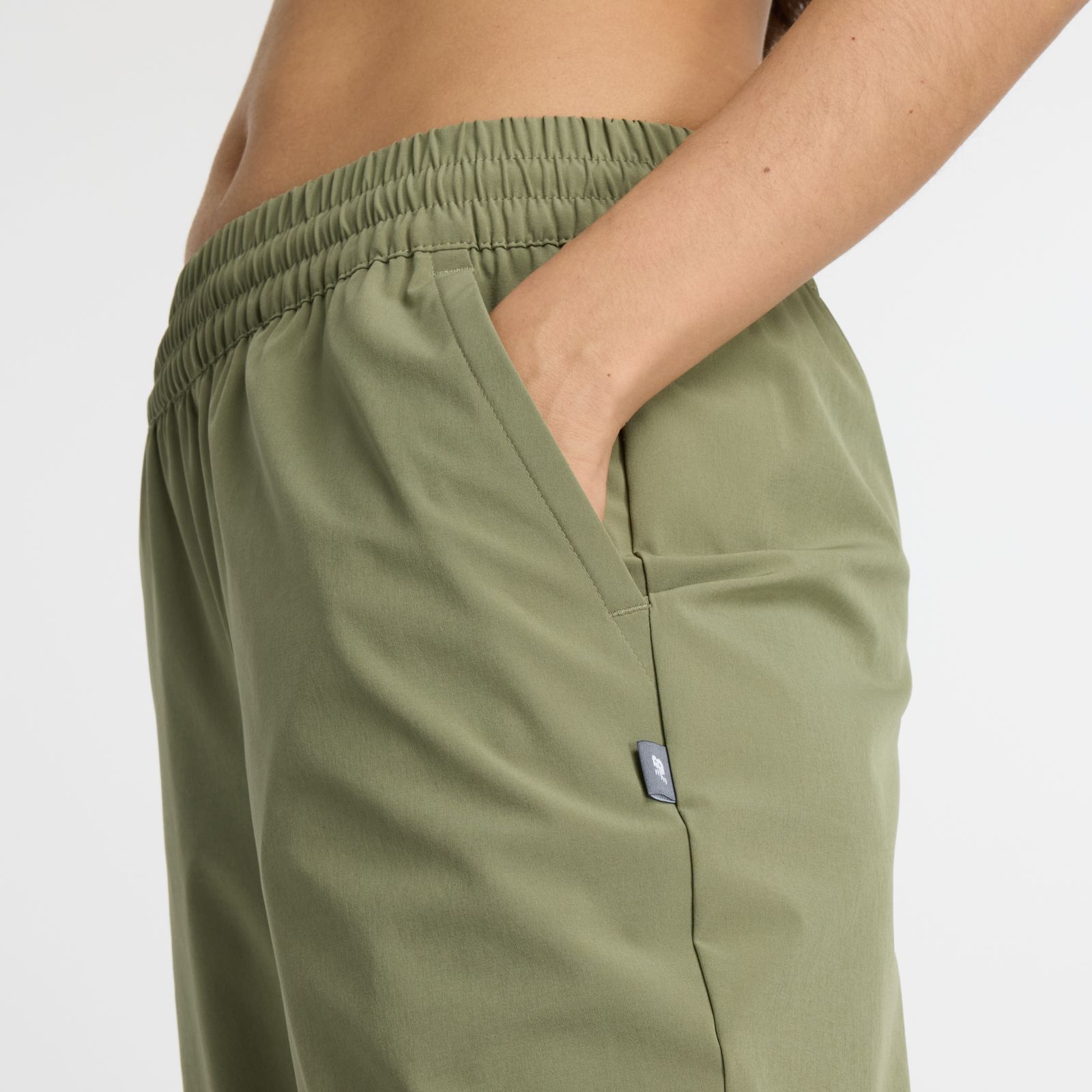 Женские брюки New Balance Athletics Stretch Woven Jogger — фото 7
