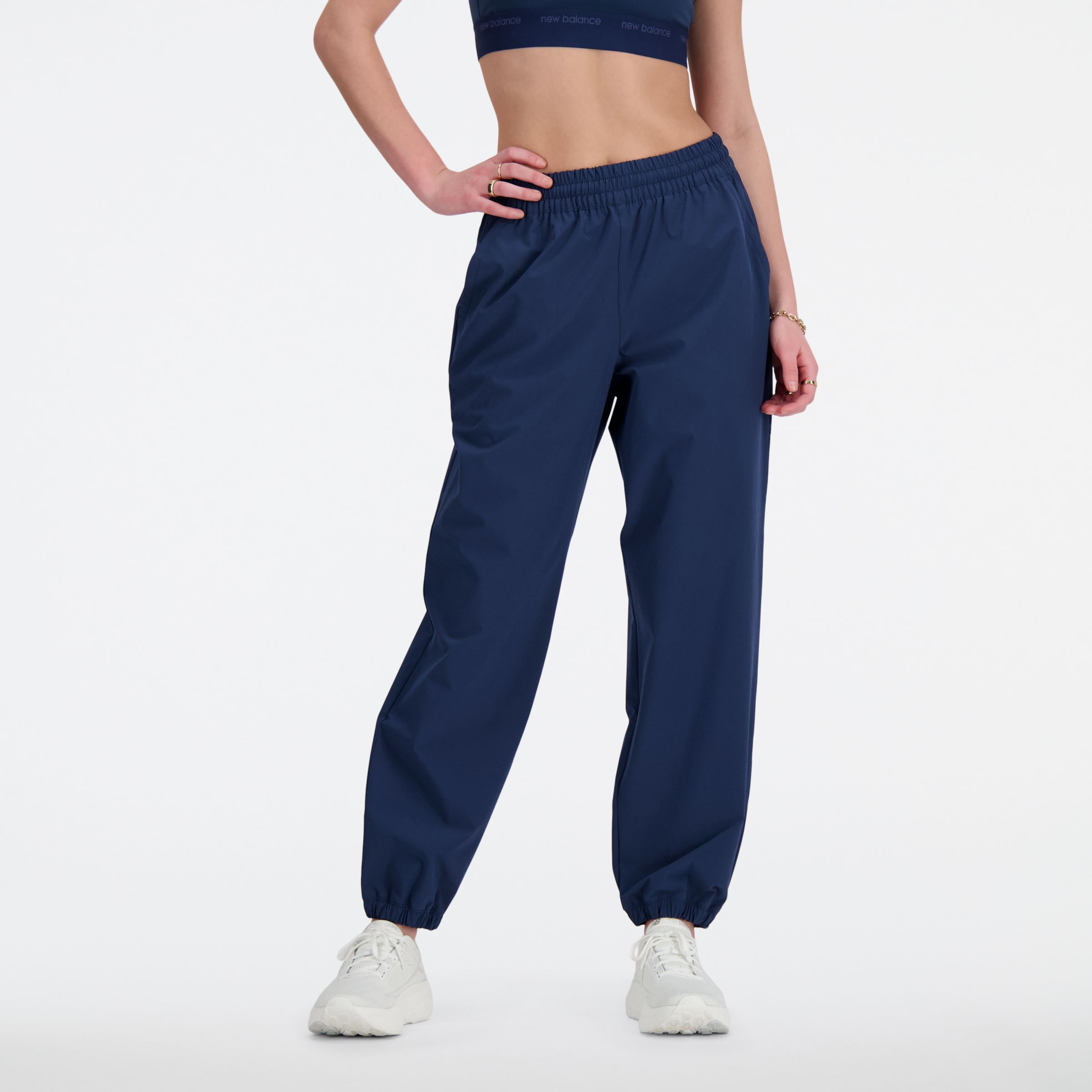 Shop New Balance Women's Athletics Stretch Woven Jogger In Blue
