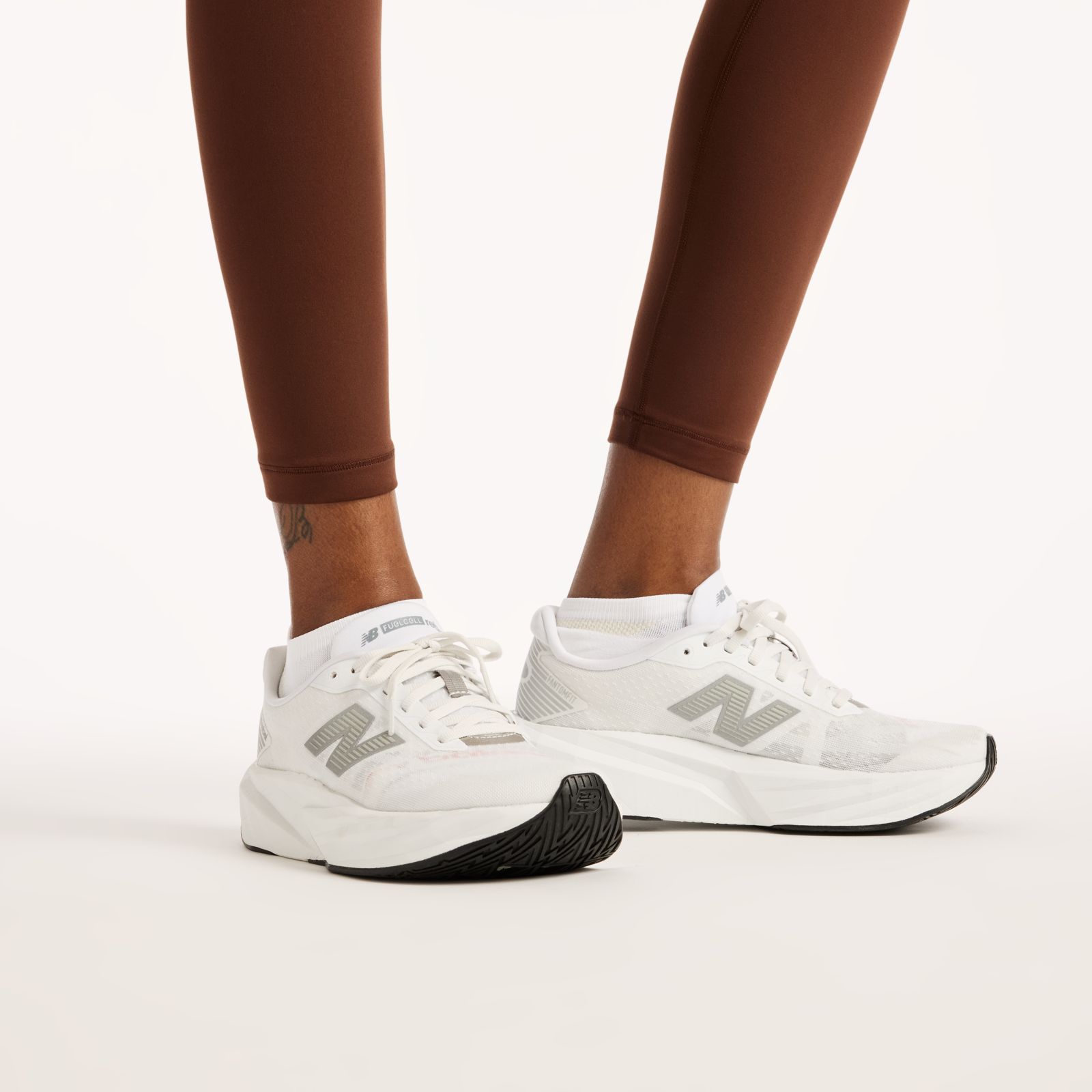 Женские брюки New Balance NB Define High Rise Legging 25" — фото 7