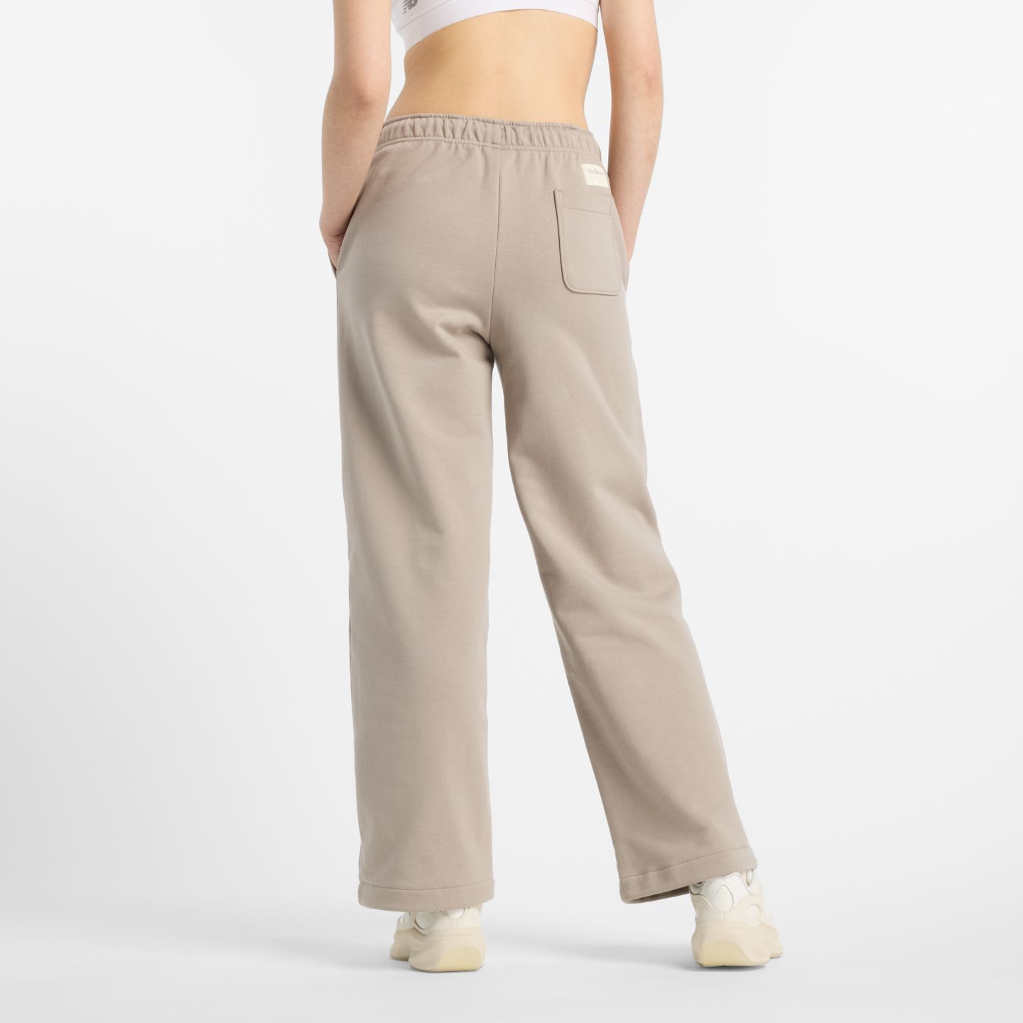Женские брюки New Balance NBX Lunar New Year Pant, цвет: Серо-бежевый — фото 3