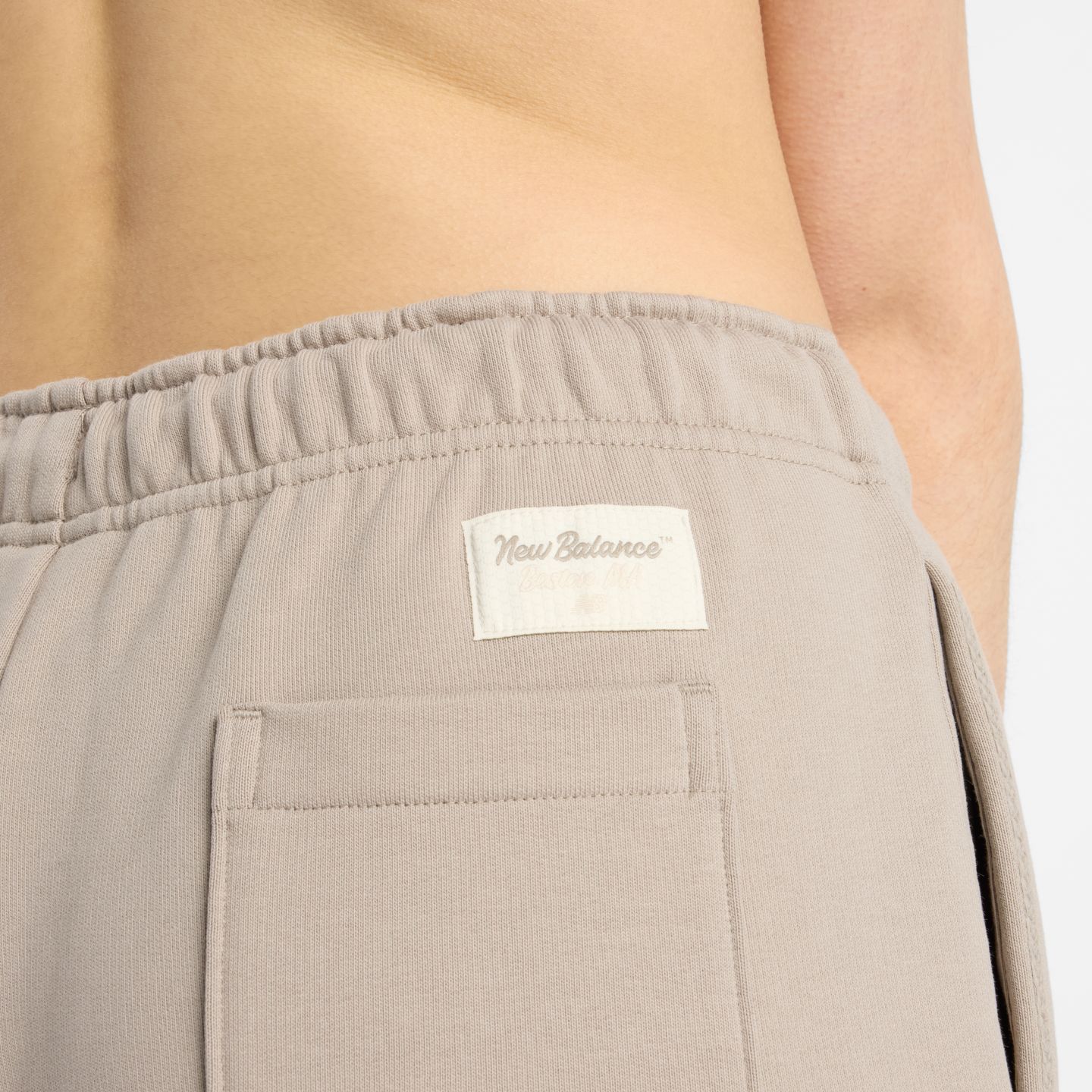Женские брюки New Balance NBX Lunar New Year Pant, цвет: Серо-бежевый — фото 8