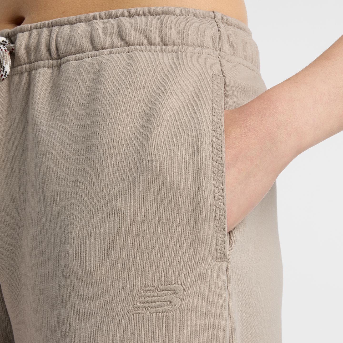 Женские брюки New Balance NBX Lunar New Year Pant, цвет: Серо-бежевый — фото 7