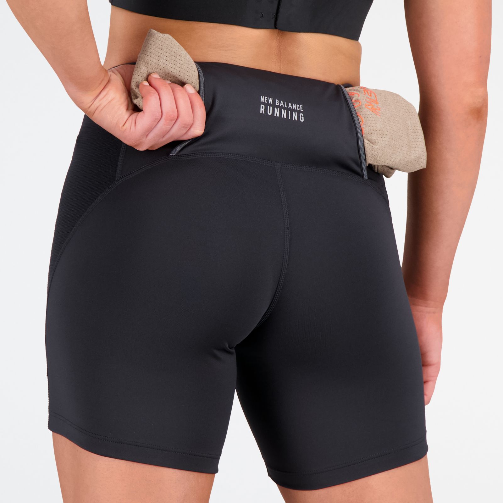 Женские брюки New Balance Impact Run Fitted Short — фото 6