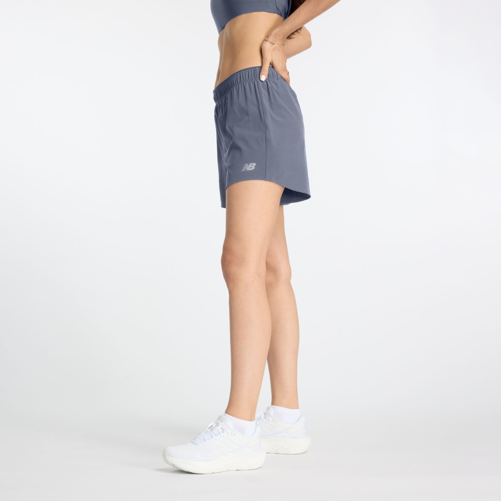 Женские брюки New Balance RC Short 5" — фото 4