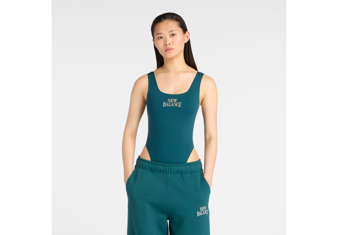 New Balance Trackside Bodysuit in Medusa Green — photo 1 of 1