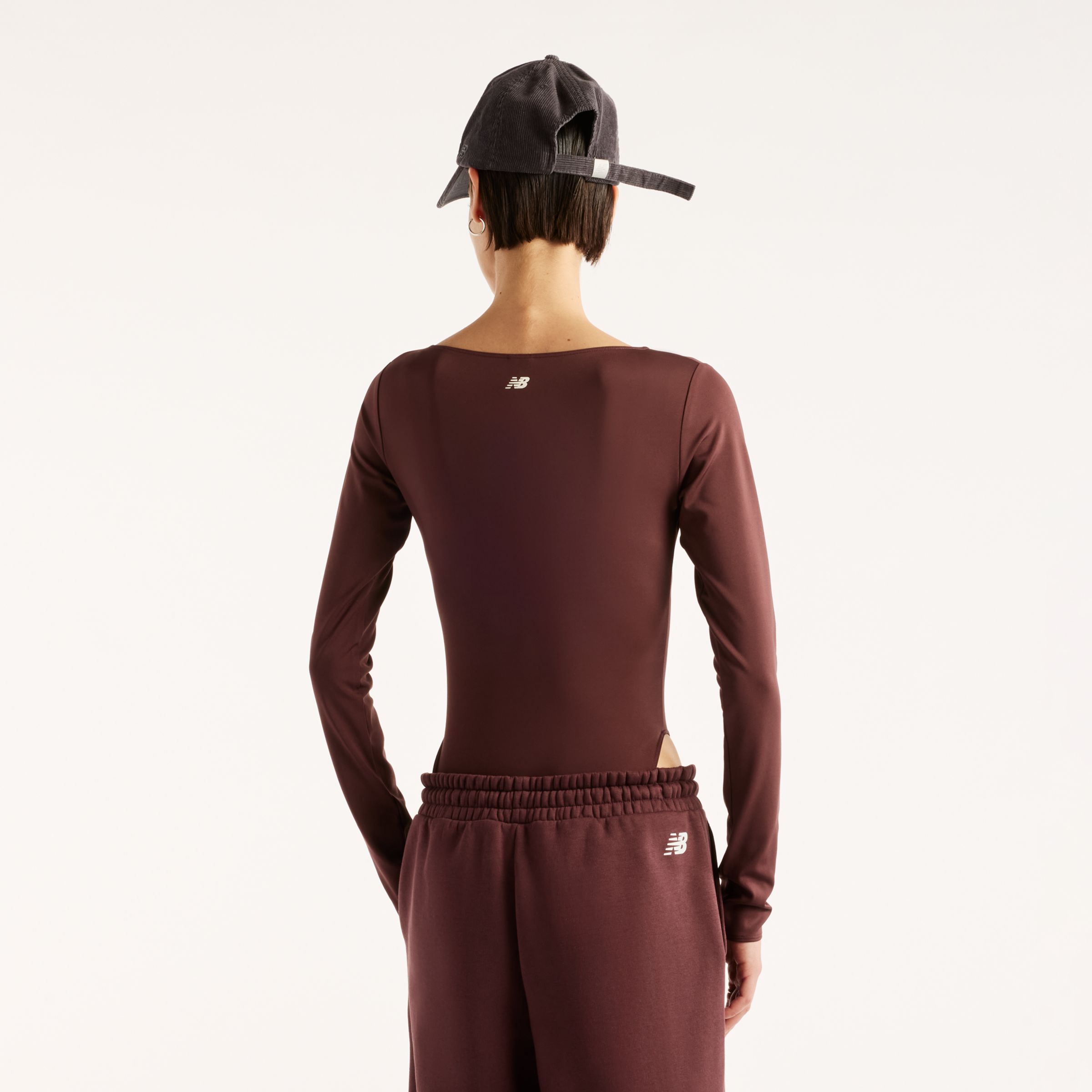 New Balance Trackside Long Sleeve Bodysuit, WS62Y3THYLR