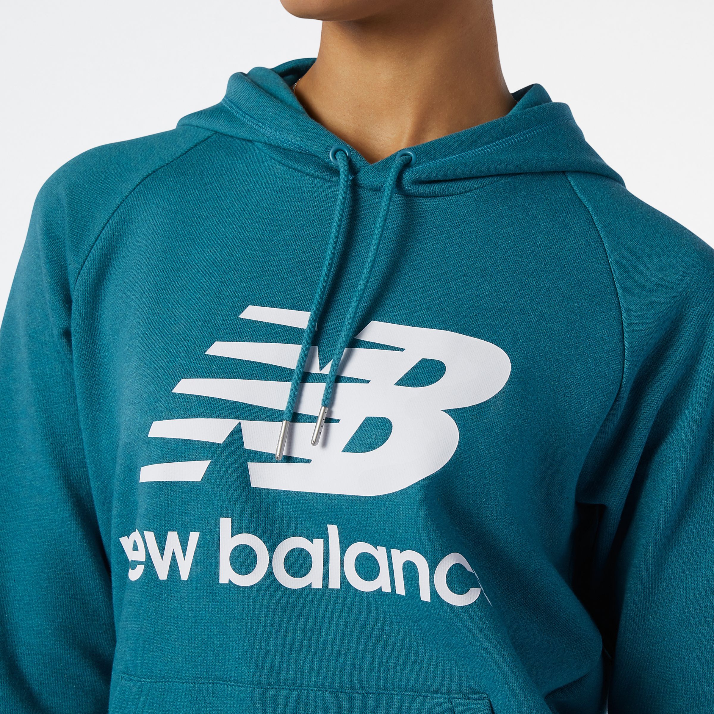 Sweats &agrave; capuche NB Essentials Pullover