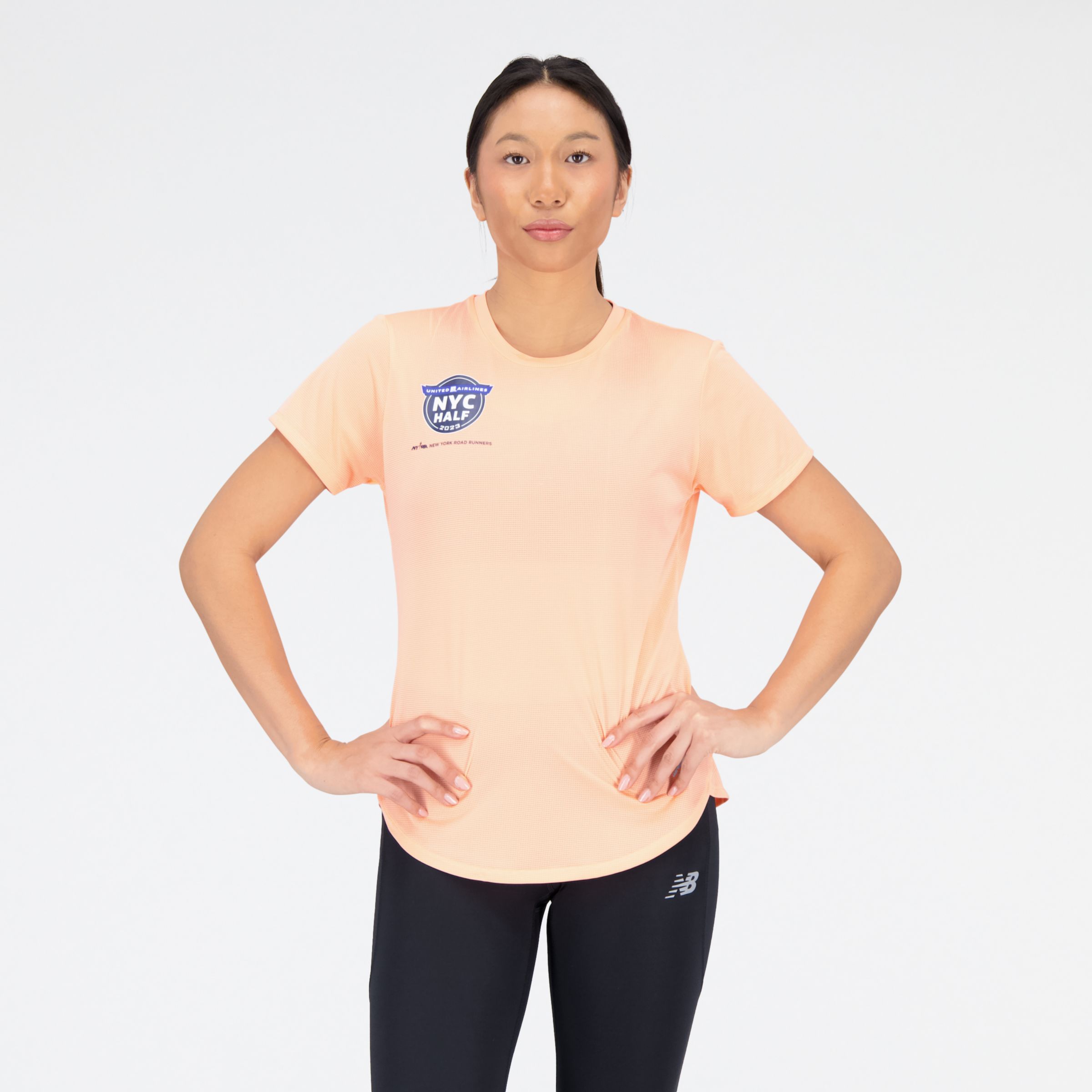 

New Balance Women's United Airlines NYC Half Training Accelerate Short Sleeve Top Orange - Orange