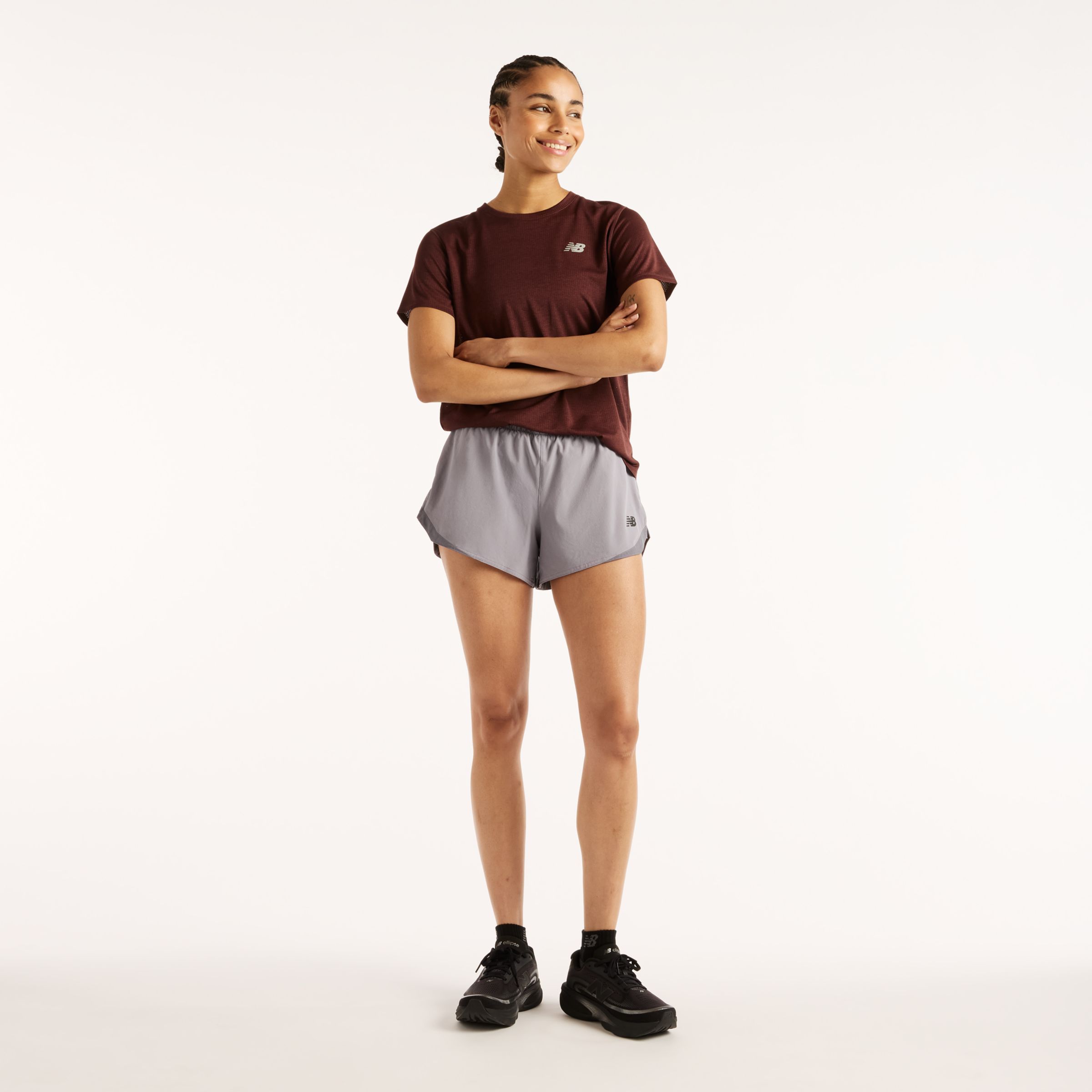 New Balance Kvinnor RC Essential T-Shirt i Brun Poly Sticka