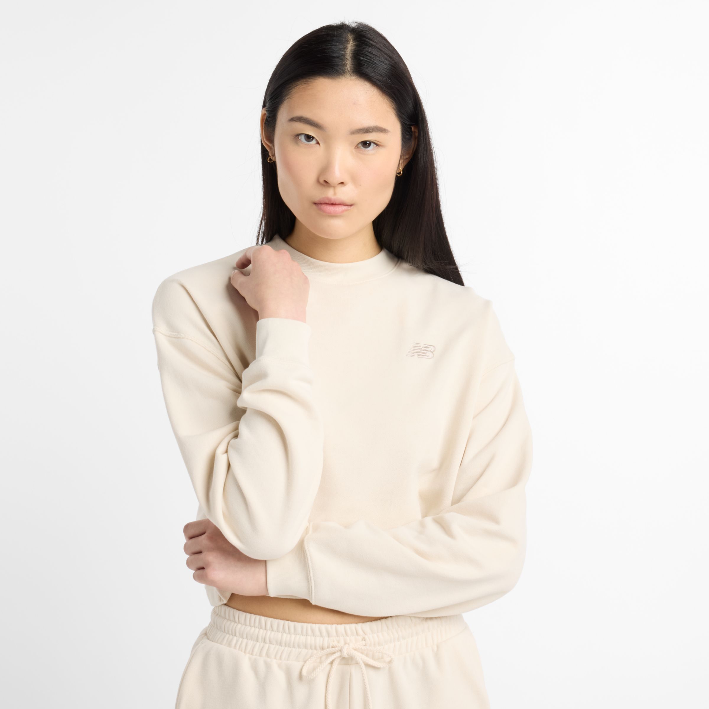 New Balance Donna Coastal Fleece Crew in Beige, Taglia S
