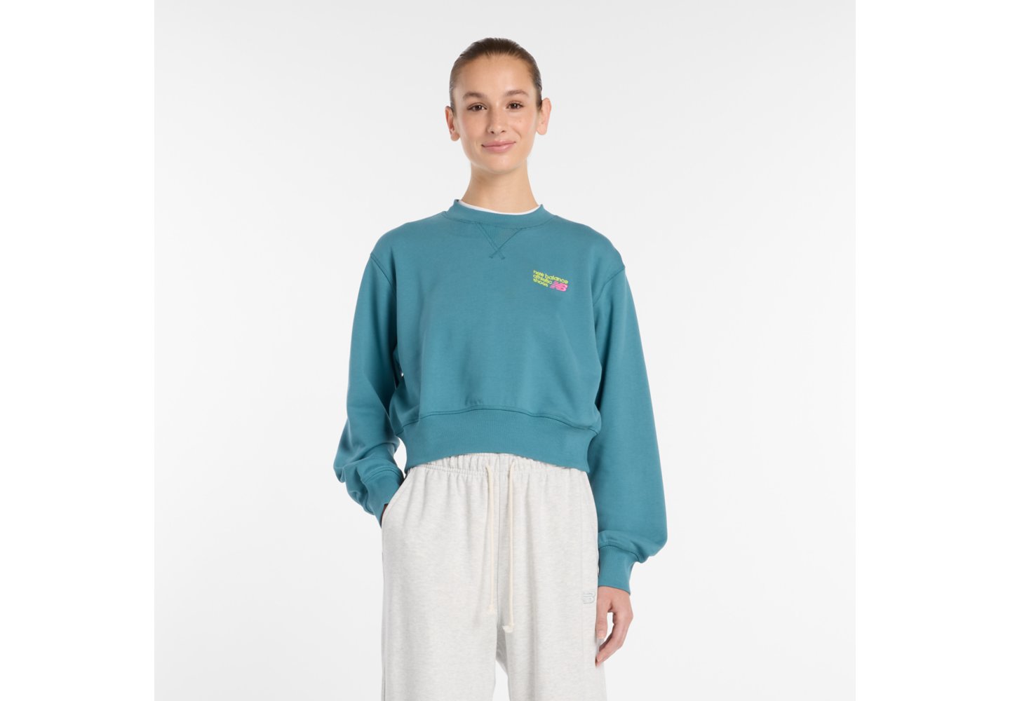 New Balance Athletics Premium Logo Relaxed Crop Crew in Big Teal — photo 1 of 1