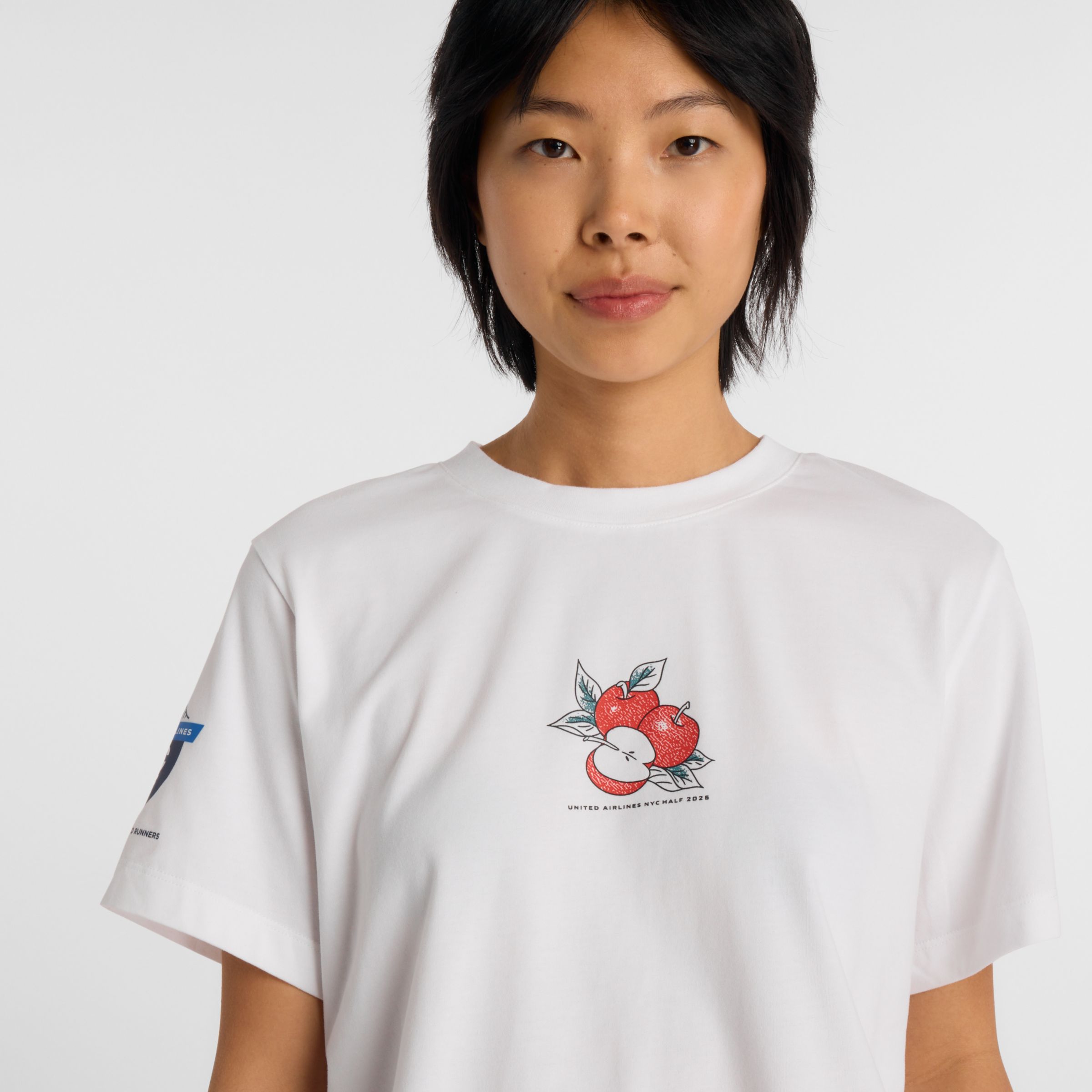 United Airlines NYC Half Women's Graphic T-Shirt - Apple