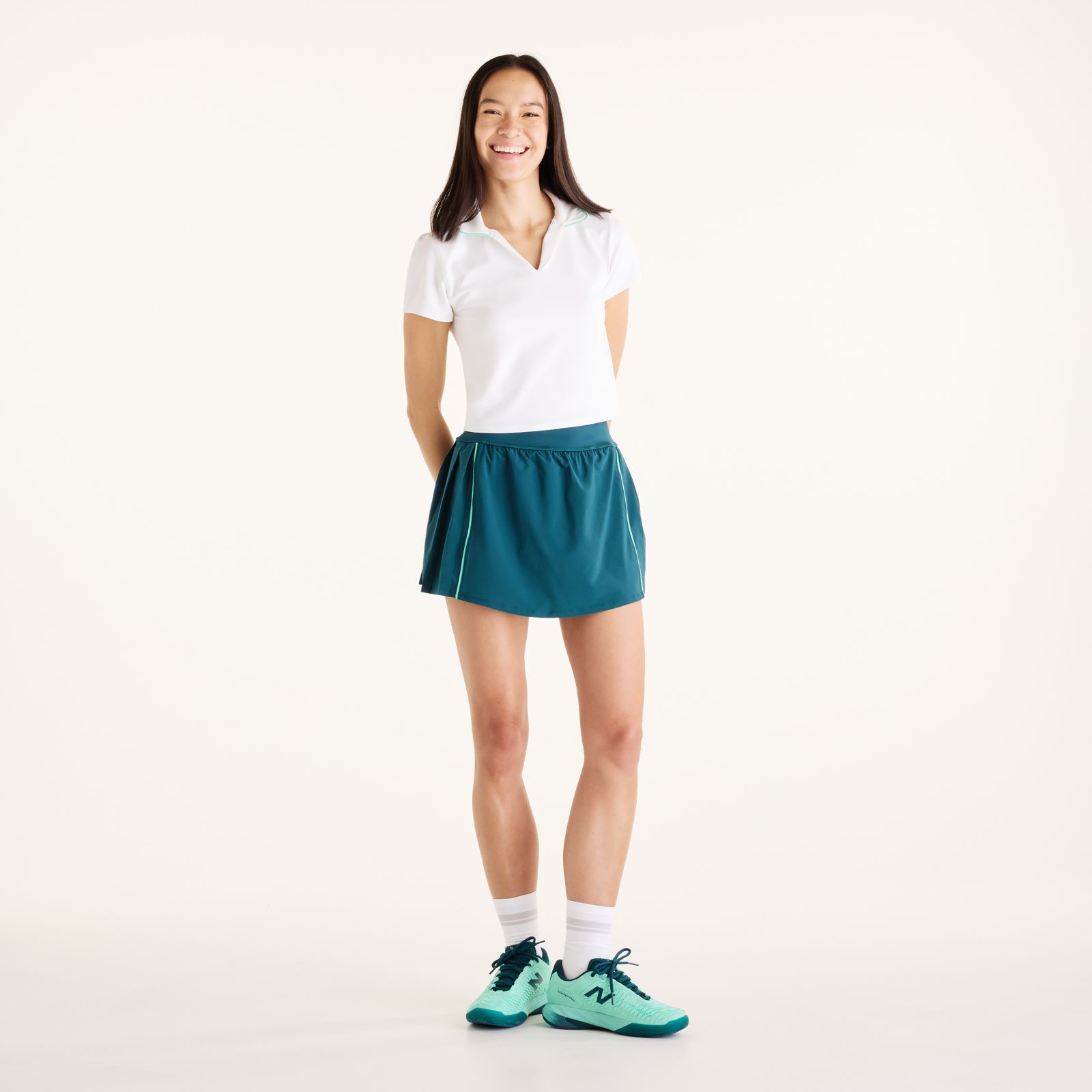 Женские футболки New Balance Tournament Polo — фото 2