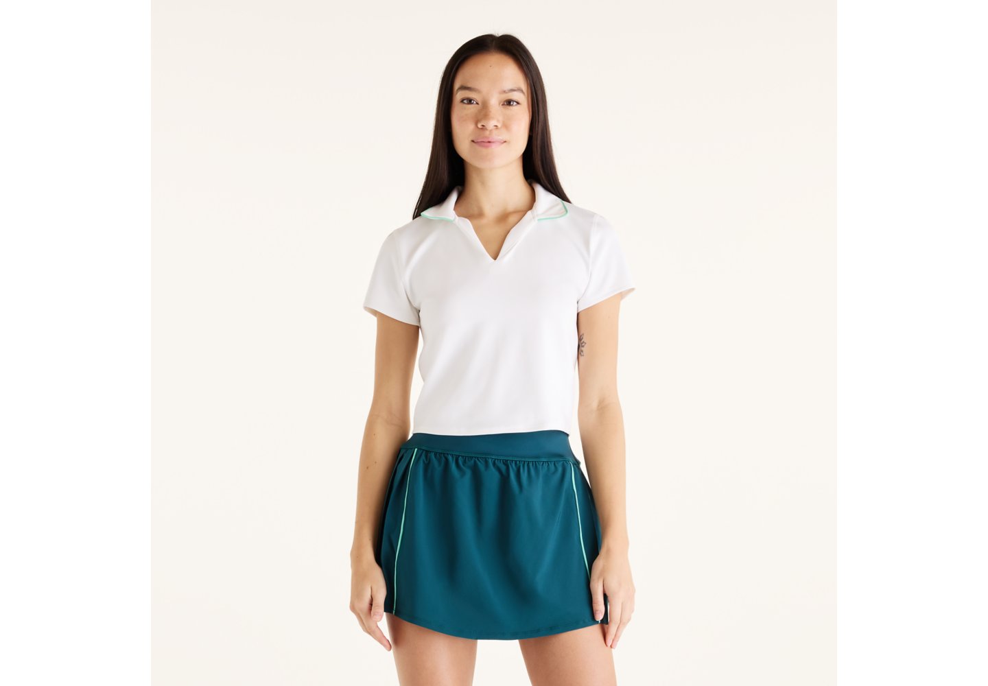New Balance Tournament Polo in White With Deep End — photo 1 of 1