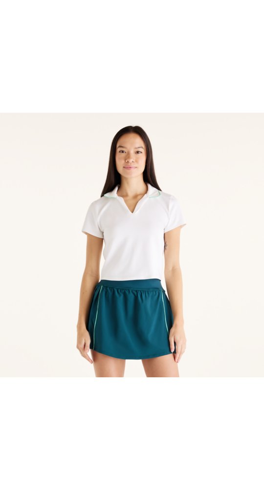 New Balance Tournament Polo in White With Deep End