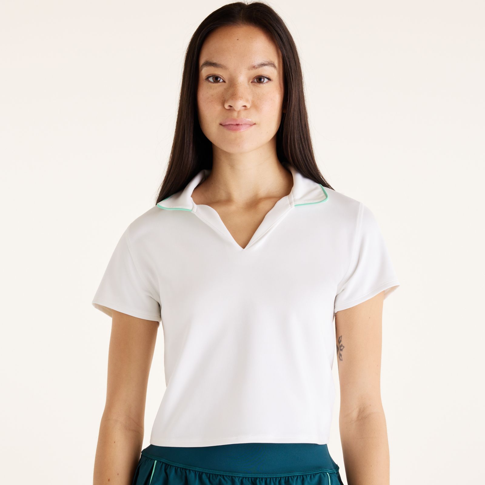 Женские футболки New Balance Tournament Polo — фото 3