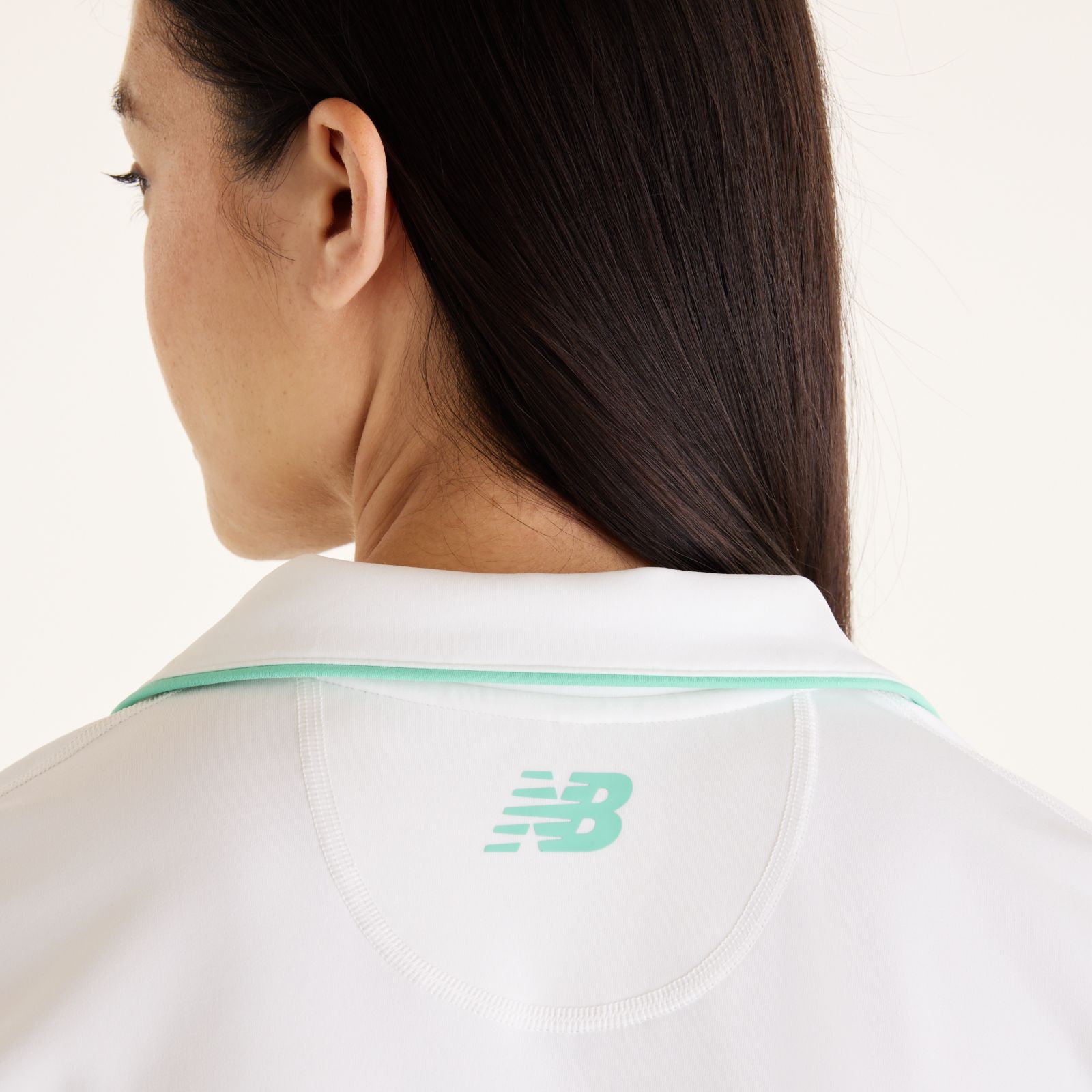 Женские футболки New Balance Tournament Polo — фото 4
