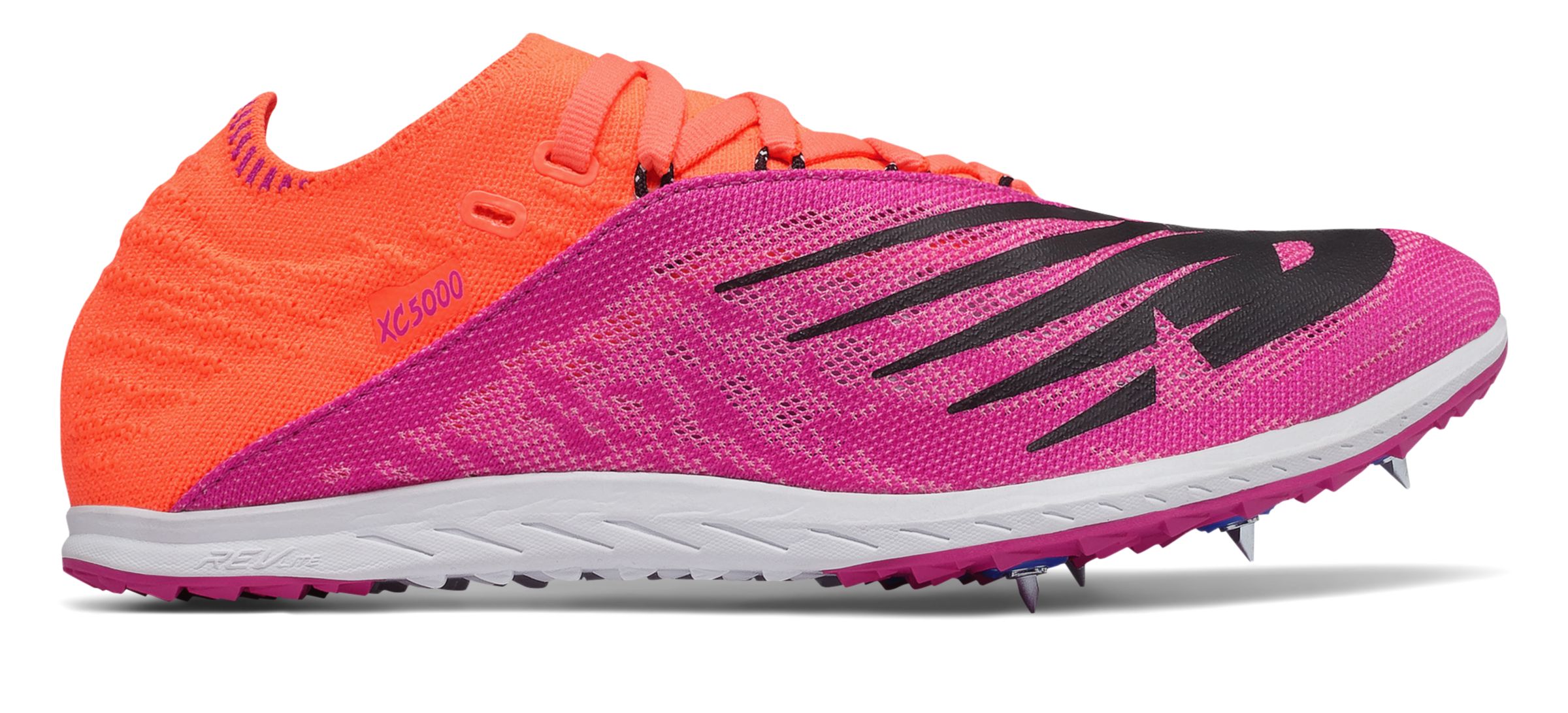 pink new balance spikes