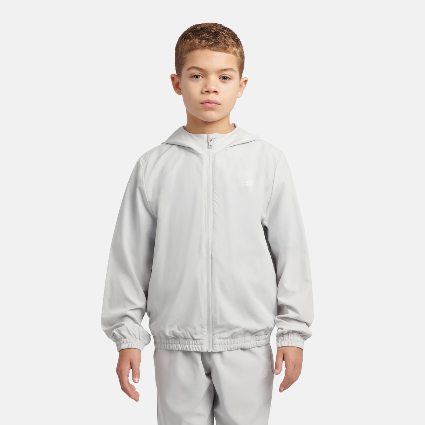 Детская куртка New Balance NB Essential Full Zip Track Jacket, цвет: Серый — фото 1
